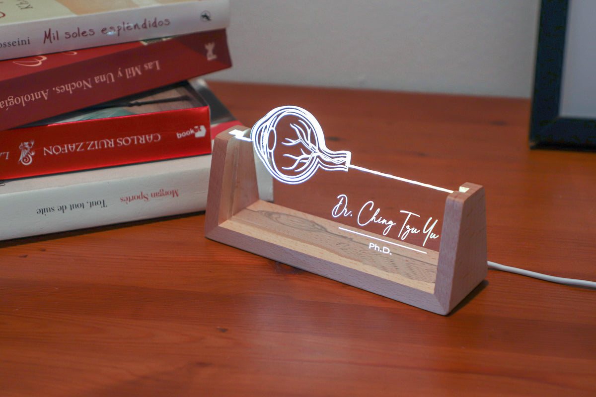 LED desk nameplate featuring a detailed human eye anatomy design, illuminated in a white tone, perfect as a unique and thoughtful gift for opticians, ophthalmologists, or eye care professionals.