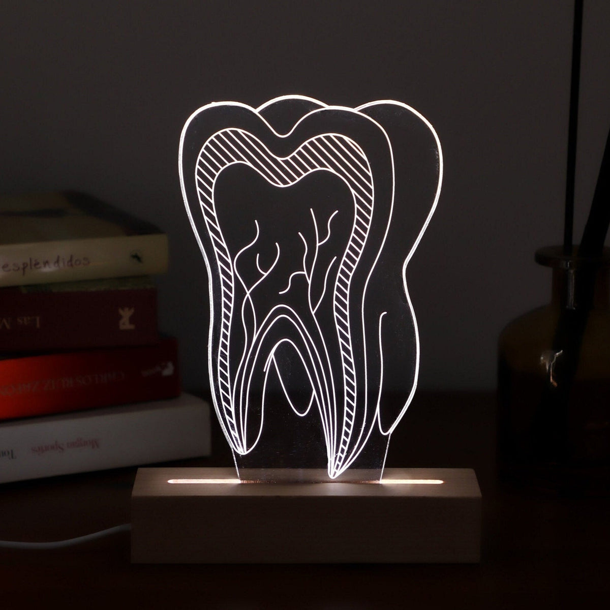 Unique 3D illusion lamp showcasing a glowing tooth design, a thoughtful gift for dentists or dental professionals