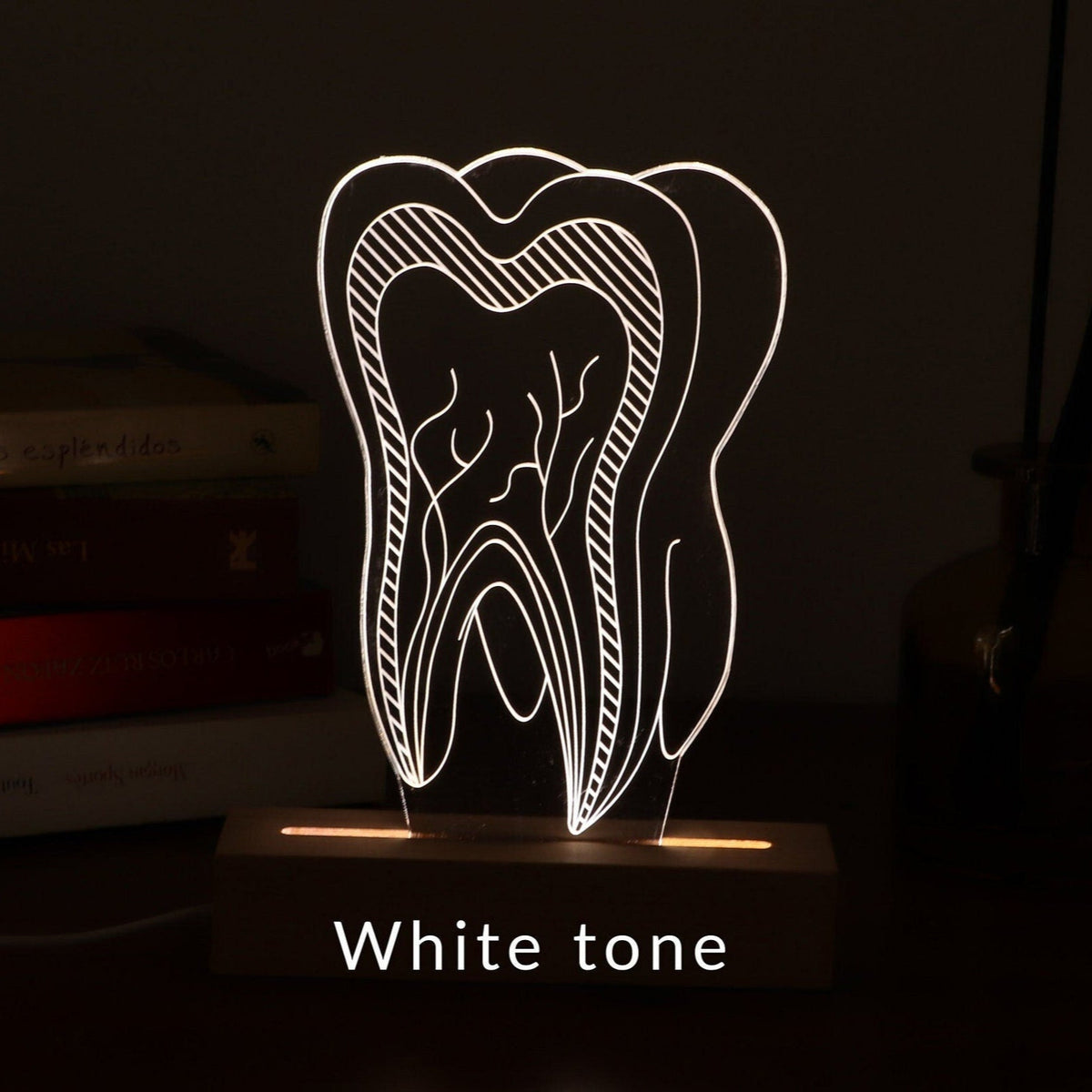 Unique 3D illusion lamp showcasing a glowing tooth design, a thoughtful gift for dentists or dental professionals