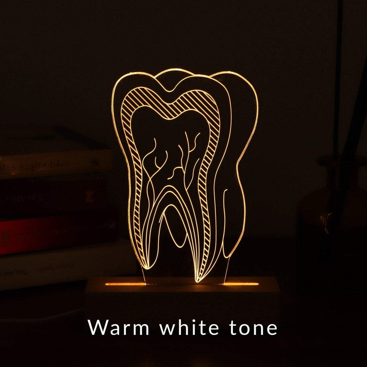 Unique 3D illusion lamp showcasing a glowing tooth design, a thoughtful gift for dentists or dental professionals