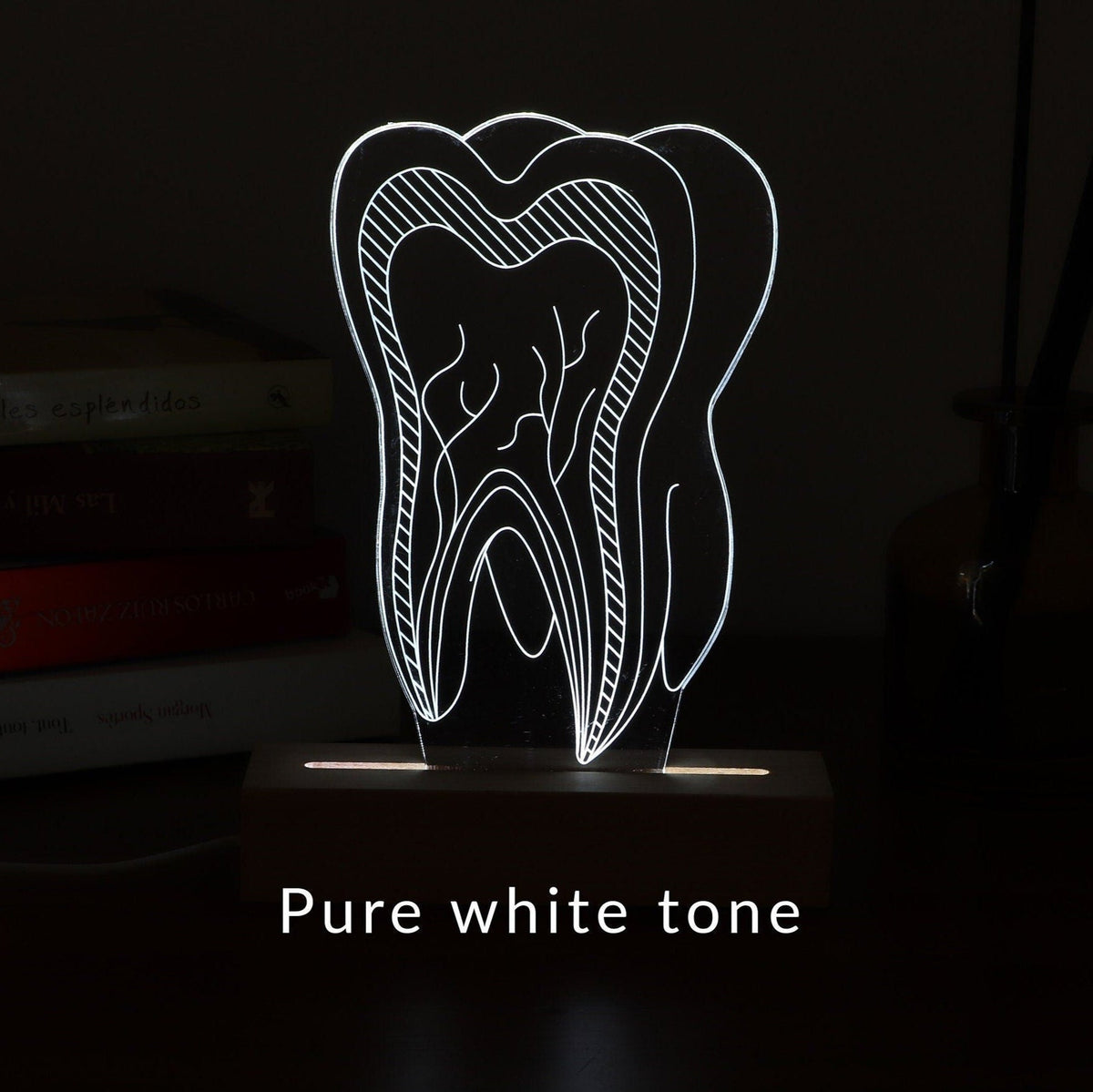Unique 3D illusion lamp showcasing a glowing tooth design, a thoughtful gift for dentists or dental professionals