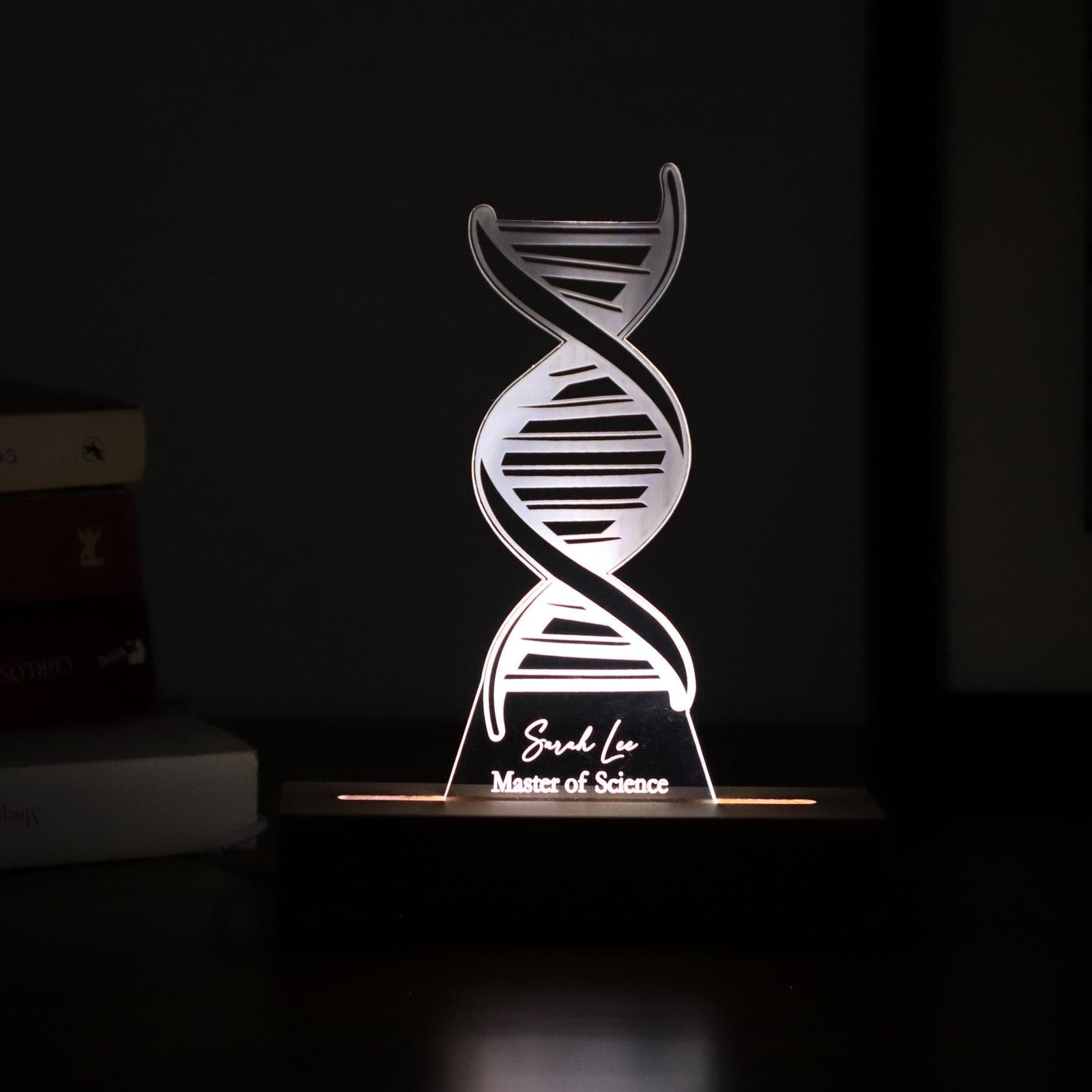 3D illusion lamp featuring a detailed DNA double helix design, illuminated in a white tone, personalized with a name, perfect as a unique and thoughtful gift for geneticists, scientists, or medical professionals specializing in human genome research