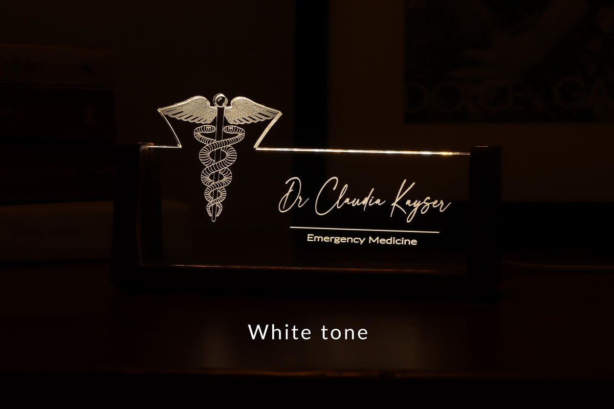 LED desk nameplate featuring a detailed Caduceus symbol design, illuminated in a white tone, perfect as a unique and thoughtful gift for doctors, healthcare professionals, or medical practitioners.