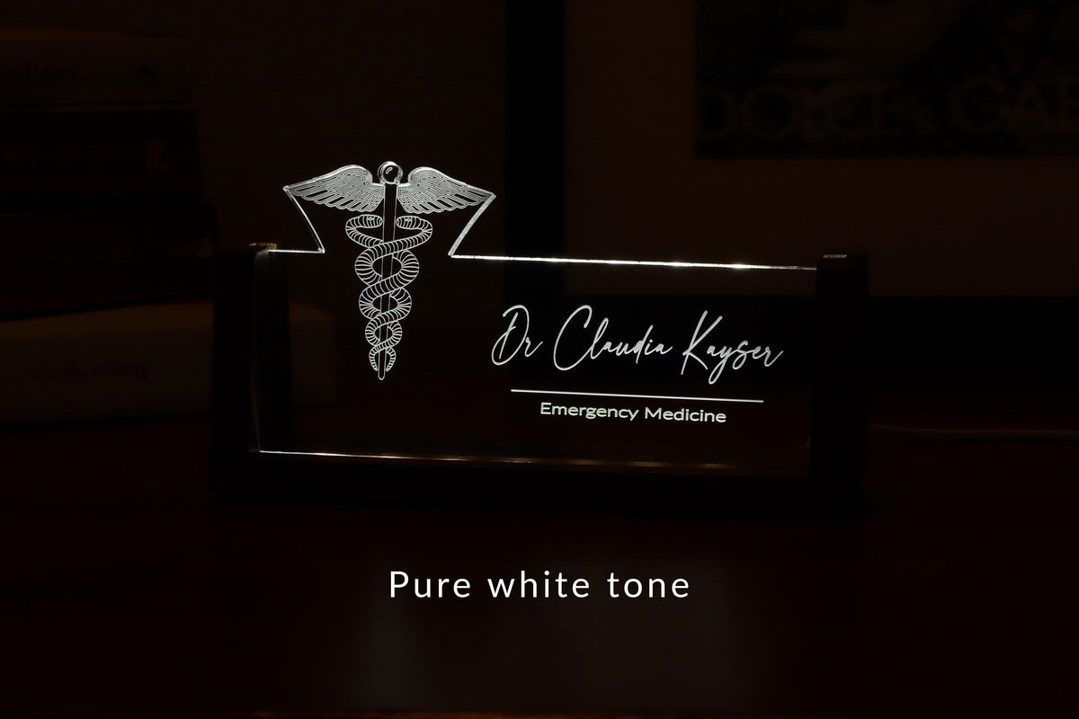 LED desk nameplate featuring a detailed Caduceus symbol design, illuminated in a white tone, perfect as a unique and thoughtful gift for doctors, healthcare professionals, or medical practitioners.