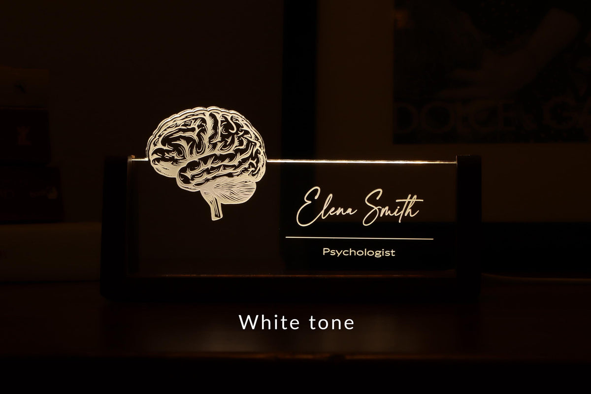 LED desk nameplate featuring a detailed brain anatomy design, illuminated in a white tone, perfect as a unique and thoughtful gift for psychologists, neurologists, or medical professionals specializing in brain health.