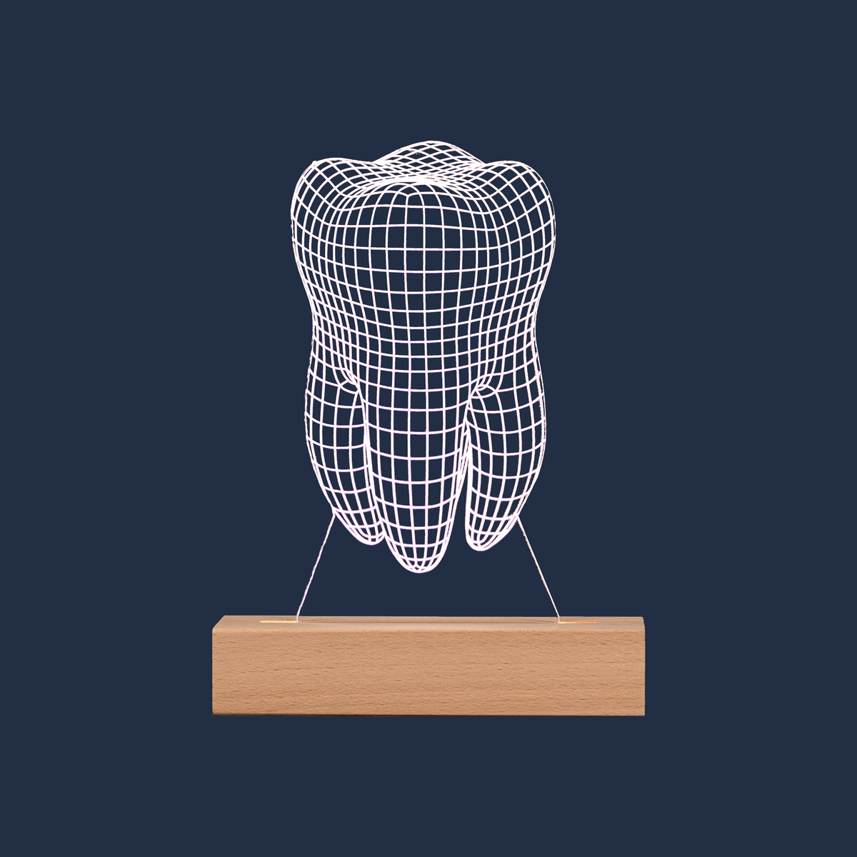 Tooth LED lamp on a plain background