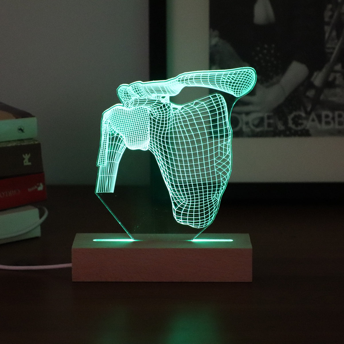 3D illusion lamp featuring a detailed human shoulder anatomy design, illuminated in a green tone, perfect as a unique and thoughtful gift for orthopedic specialists, physiotherapists, or medical professionals focusing on shoulder health.