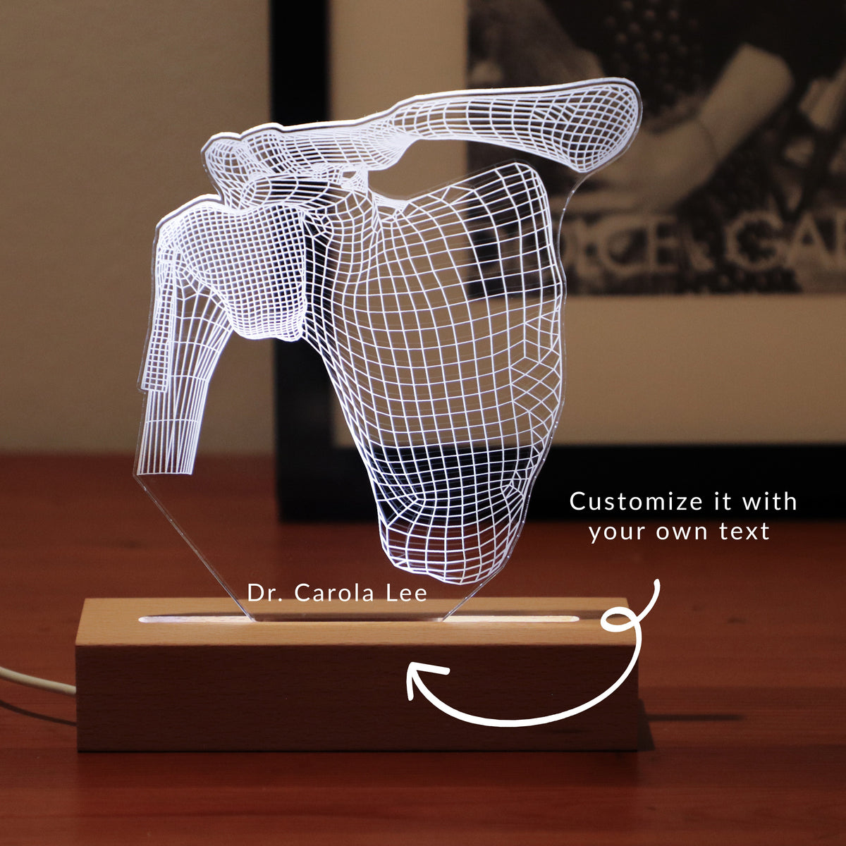 3D illusion lamp featuring a detailed human shoulder anatomy design, illuminated in a white tone, perfect as a unique and thoughtful gift for orthopedic specialists, physiotherapists, or medical professionals focusing on shoulder health.