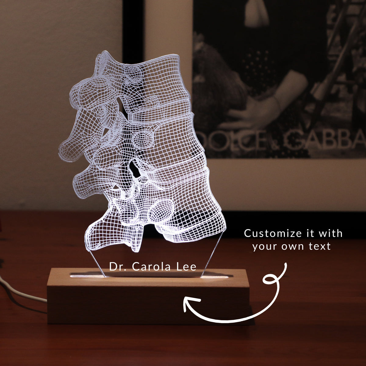 3D illusion lamp featuring a detailed vertebral column anatomy design, illuminated in a white tone, perfect as a unique and thoughtful gift for chiropractors, orthopedic specialists, or medical professionals focusing on spinal health.