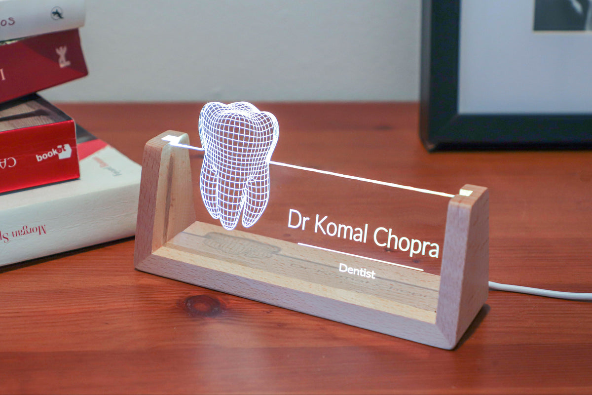 LED desk nameplate featuring a detailed tooth anatomy design, illuminated in a white tone, perfect as a unique and thoughtful gift for dentists or dental professionals.