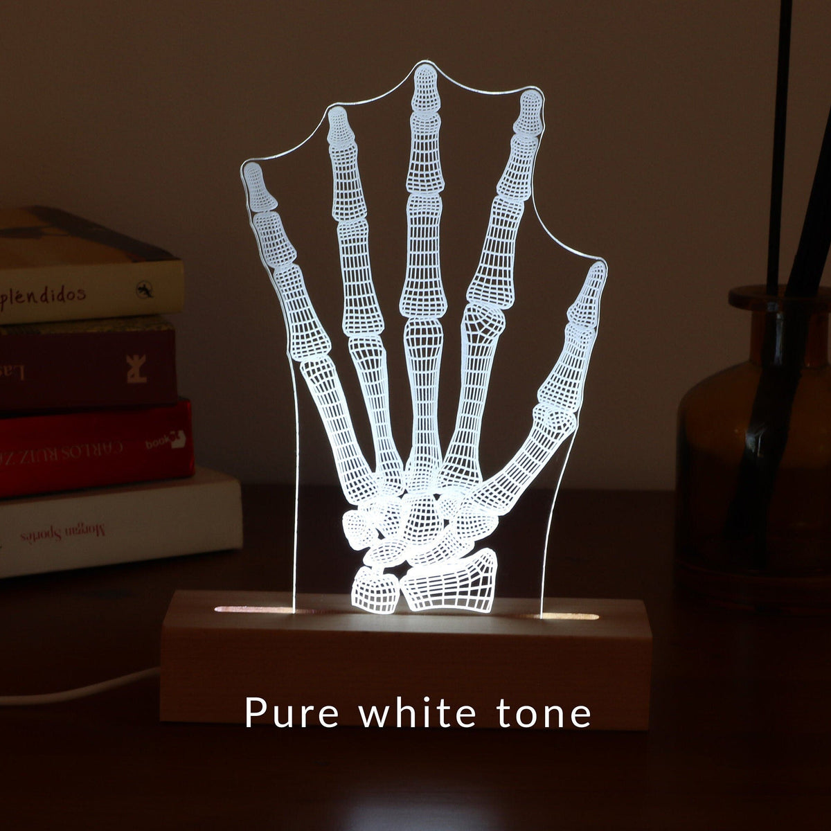 3D illusion lamp featuring a detailed human hand bone anatomy design, illuminated in a white tone, perfect as a unique and thoughtful gift for orthopedic specialists, physiotherapists, or medical professionals focusing on hand health.