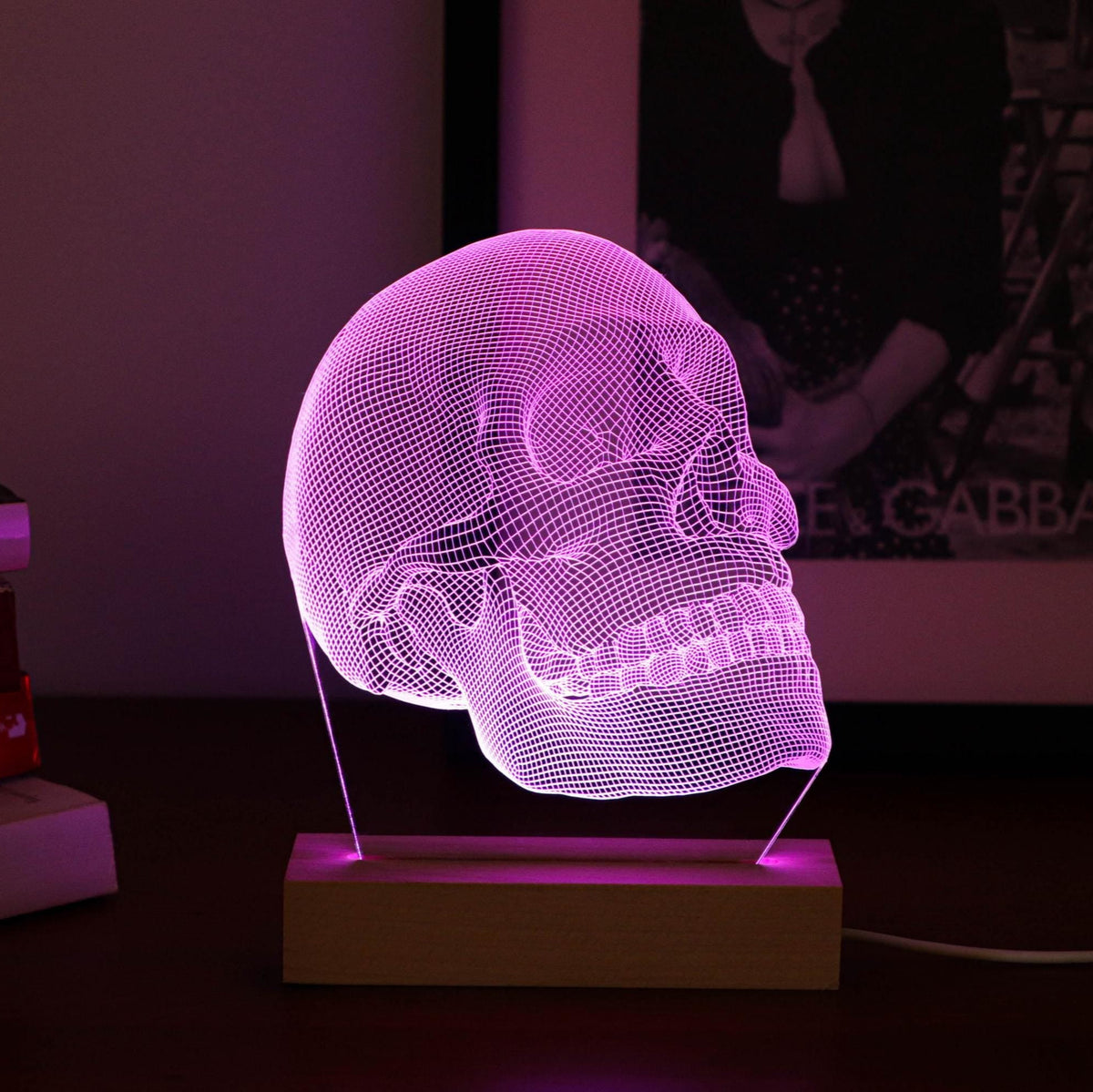 3D illusion lamp featuring a detailed human skull anatomy design, illuminated in a purple tone, perfect as a unique and thoughtful gift for medical professionals, anatomists, or educators.